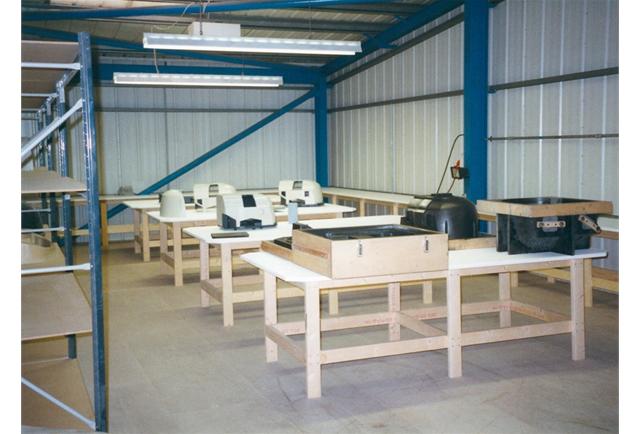 Workspaces being equipped for moulding production.